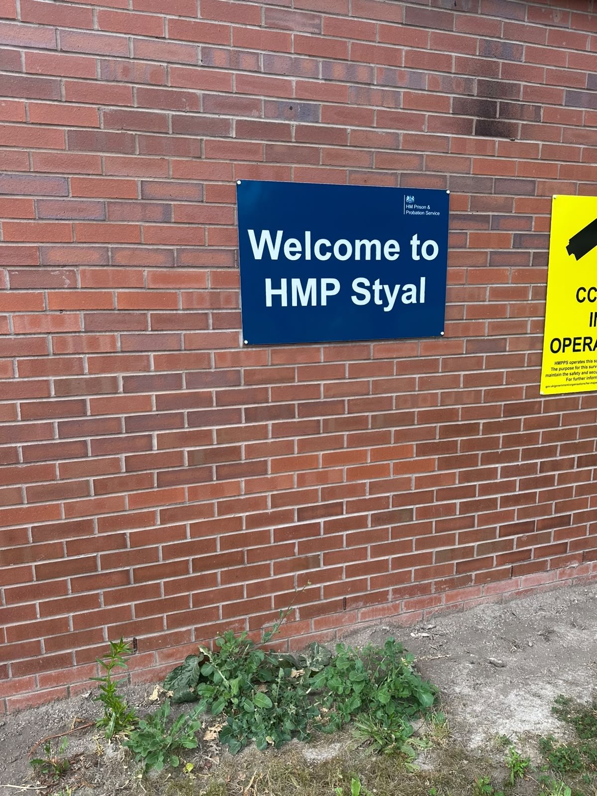 Welcome to HMP Styal sign at the prison entrance